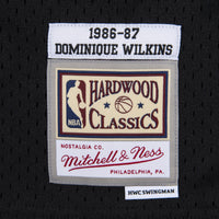 Atlanta Hawks Mitchell & Ness Dominique Wilkins 1986 Reload Swingman Authentic Jersey - Black