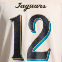 Jacksonville Jaguars Travis Hunter Nike Natural 2026 Rivalries Collection Game Jersey