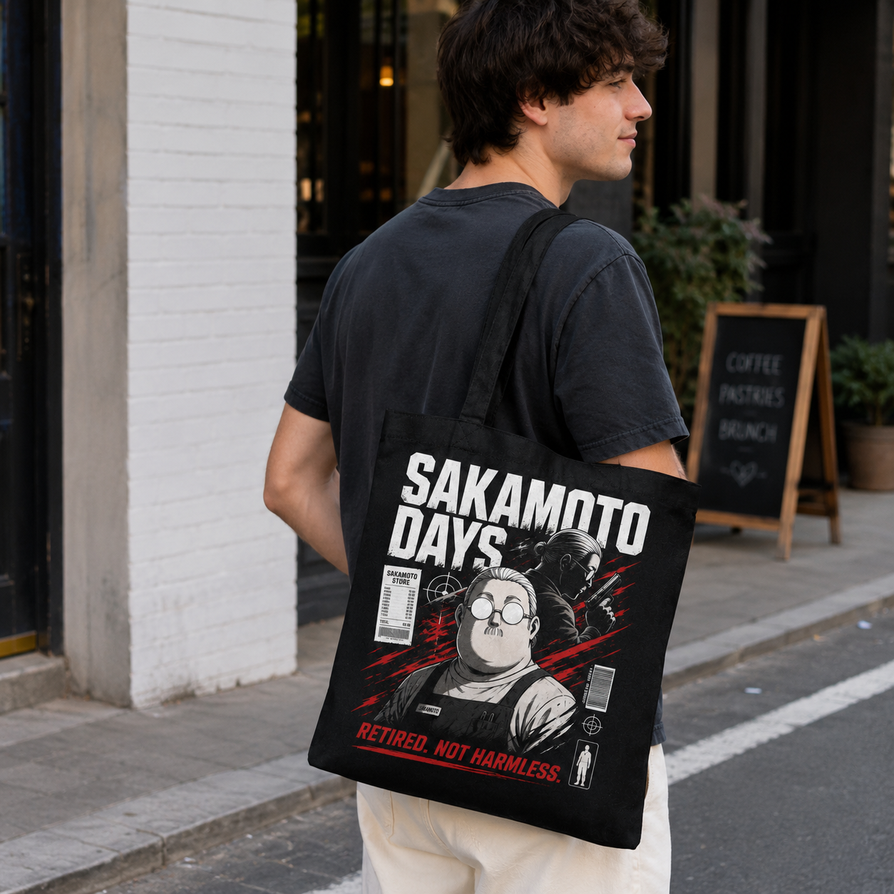 Black tote bag with Taro Sakamoto & Shin Asakura Sakamoto Days Retired Not Harmless graphic – photo 4